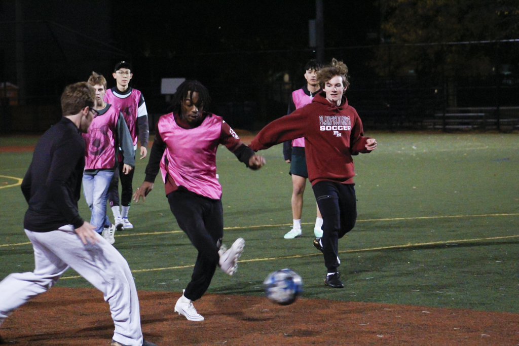 At a Renegade soccer team practice, members scrimmage at Livingston Park in the Near West neighborhood of Chicago on Oct. 15, 2024.