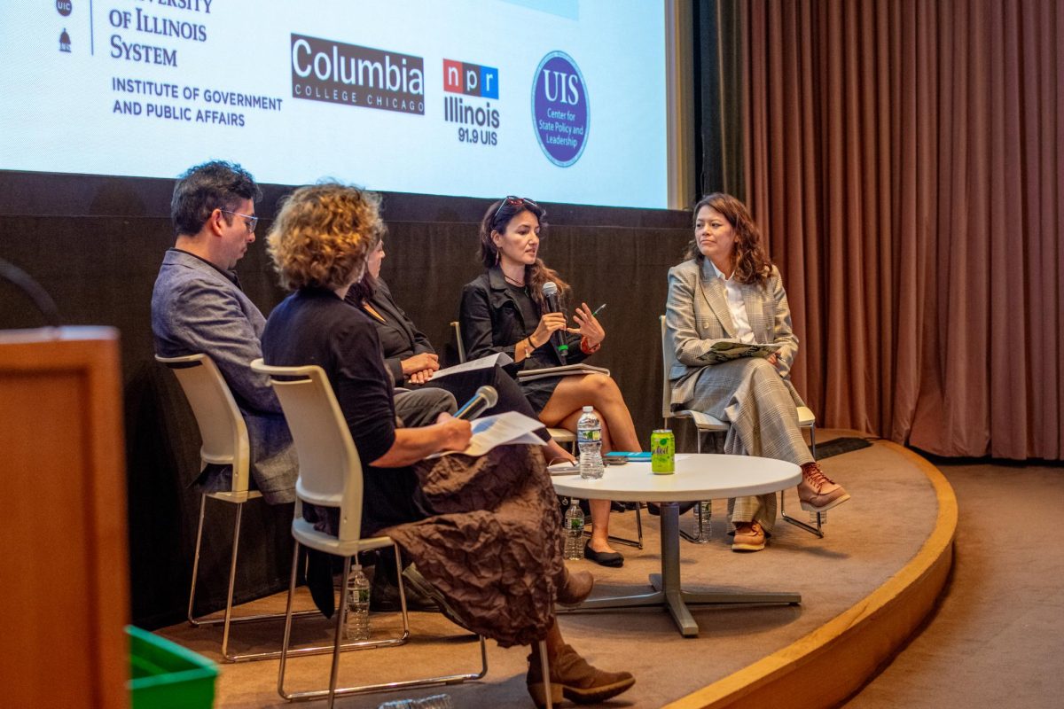 Adriana Cardona-Maguigad, an immigration reporter for WBEZ Chicago, speaks at the Undebates, a discussion focused on immigration, on Thursday, Oct. 3, 2024 in the 1104 S. Wabash building.