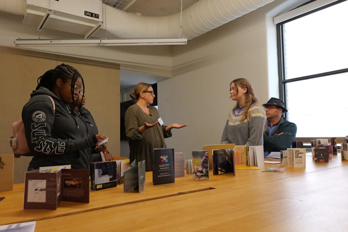 While exploring the School of Design, prospective students listen to information about each of the majors at 623 S. Wabash on Saturday, Nov. 9, 2024.