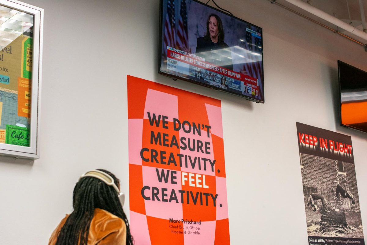 Annissa Baker, a sophomore journalism major, watches Vice President Kamala Harris' concession speech at the 33 E. Ida B. Wells Dr. building, on Nov. 6, 2024.