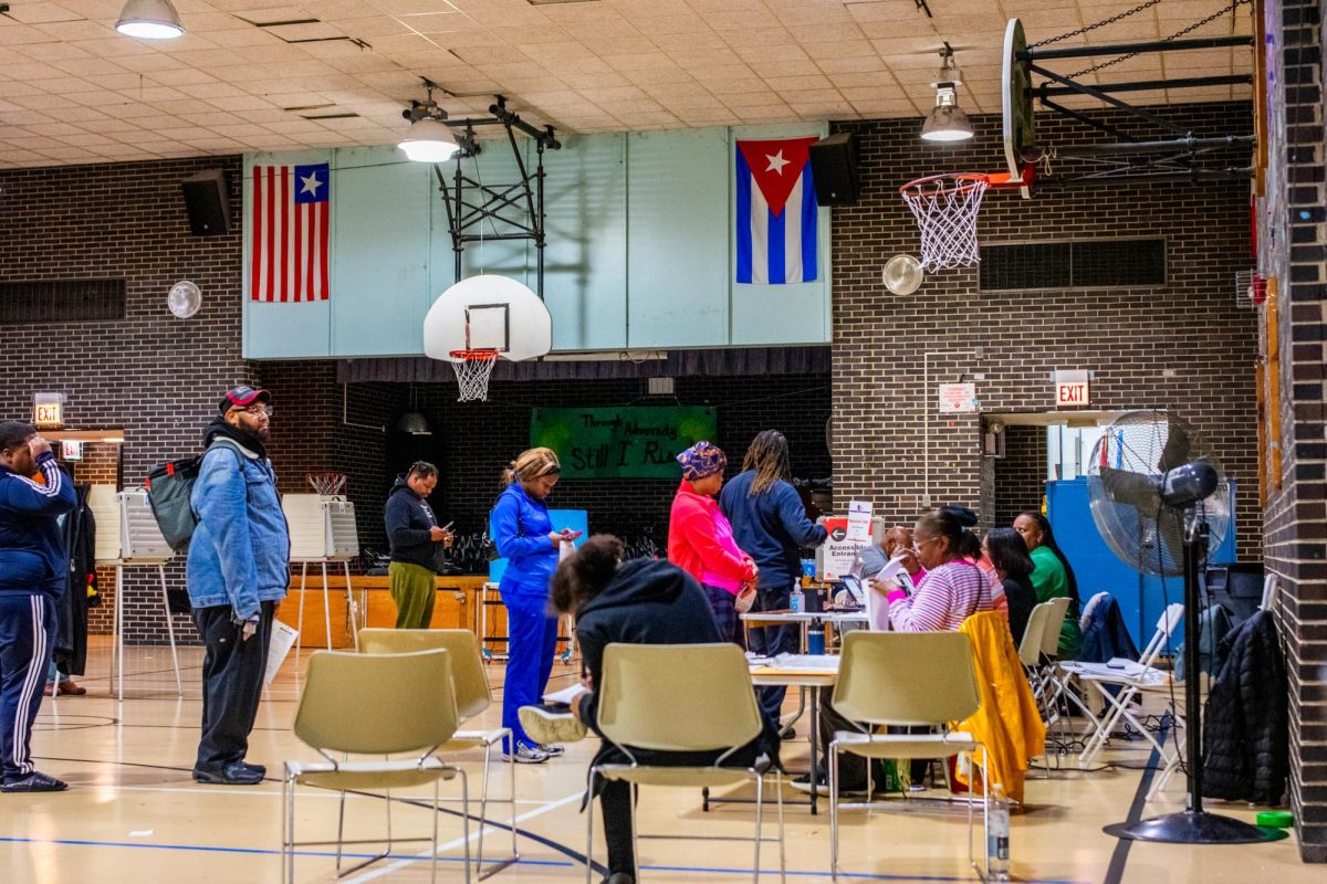 Chicago residents vote at Irvin C. Mollison Elementary School in Bronzeville, 4415 S. King Drive, on Tuesday, Nov. 5, 2024. 