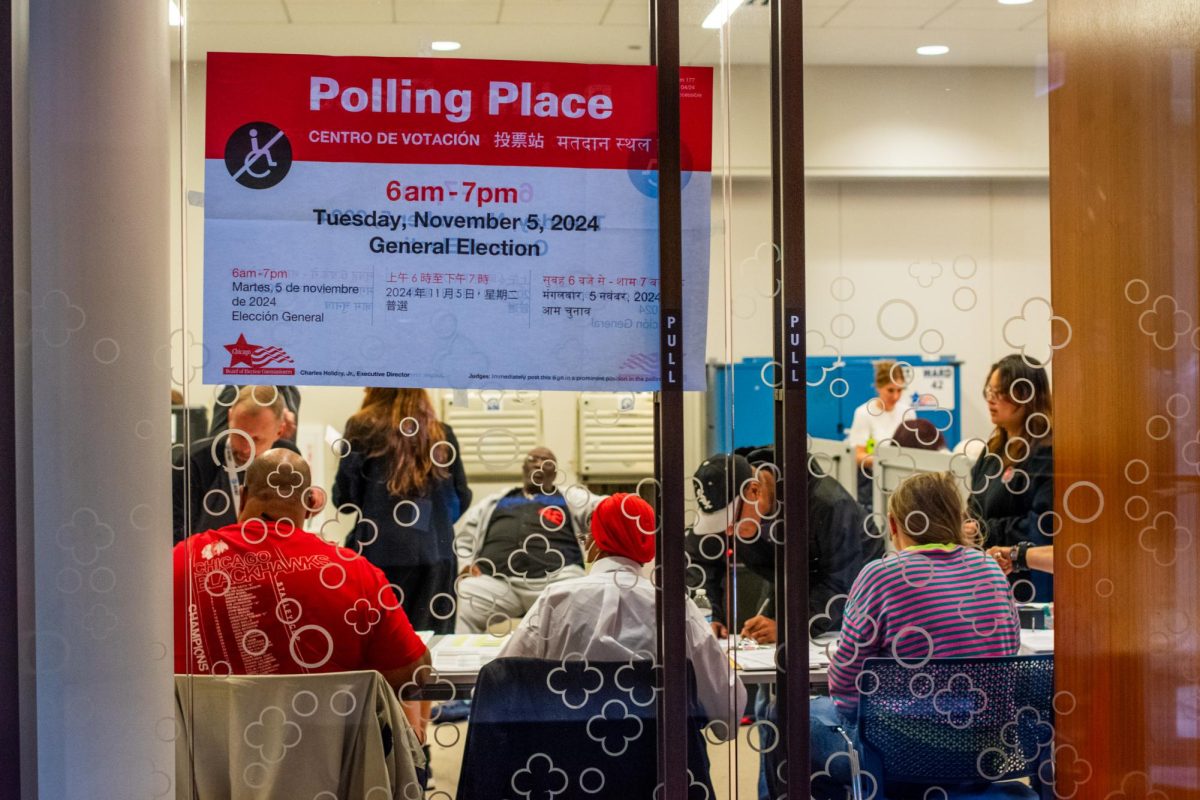 ​​Chicago residents vote at Fourth Presbyterian Church, an official polling center at 126 E. Chestnut St., on Tuesday, Nov. 5, 2024.