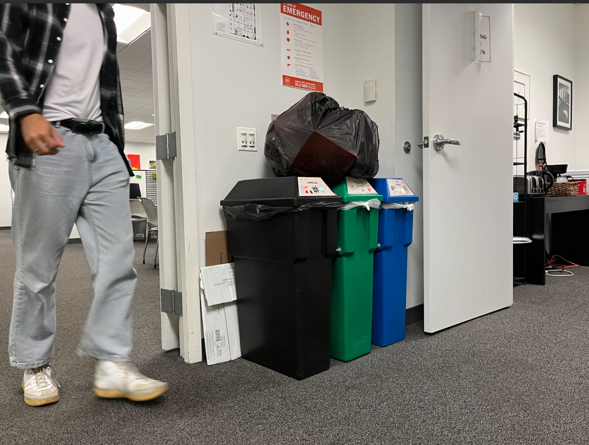 Garbage bag on top of trash bins on Monday, Oct. 28, 2024 on the first floor of 33 E. Ida B Wells.