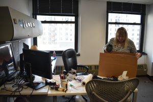 Academic scheduler Margie Barrett packs her office in the 33 E. Ida B. Wells building to move to the 600 S. Michigan building on Tuesday, Dec. 17, 2024. Faculty and staff are relocating in response to the structural administrative changes at the college that started this summer.