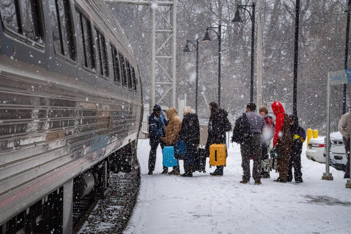 Passengers board the Floridian Amtrak train at the Connellsville Station in Pennsylvania on Sunday, Jan. 19, 2025. 