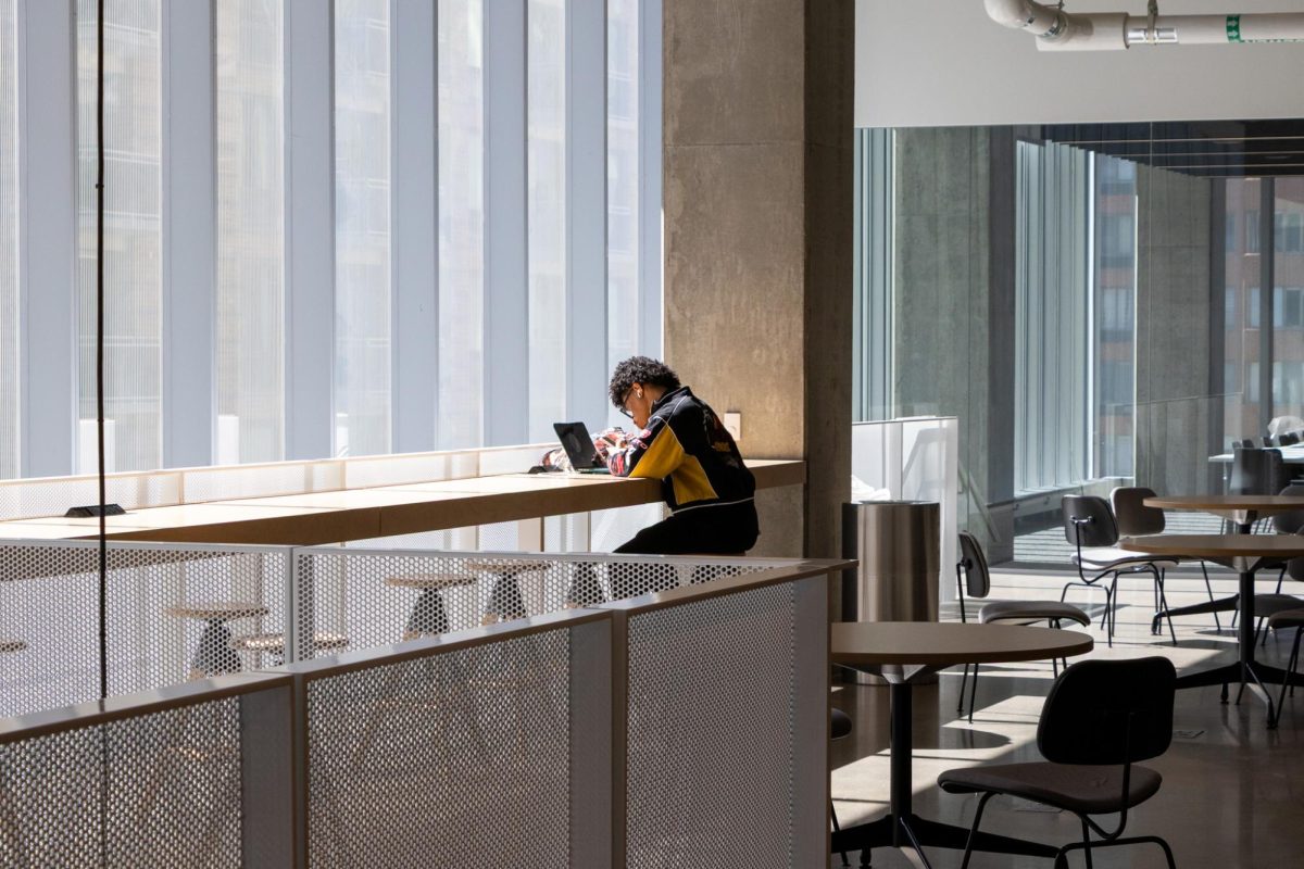 Junior fine arts major Justin Echols works on homework on the fourth floor of the Student Center on Wednesday, March 12, 2025. TB