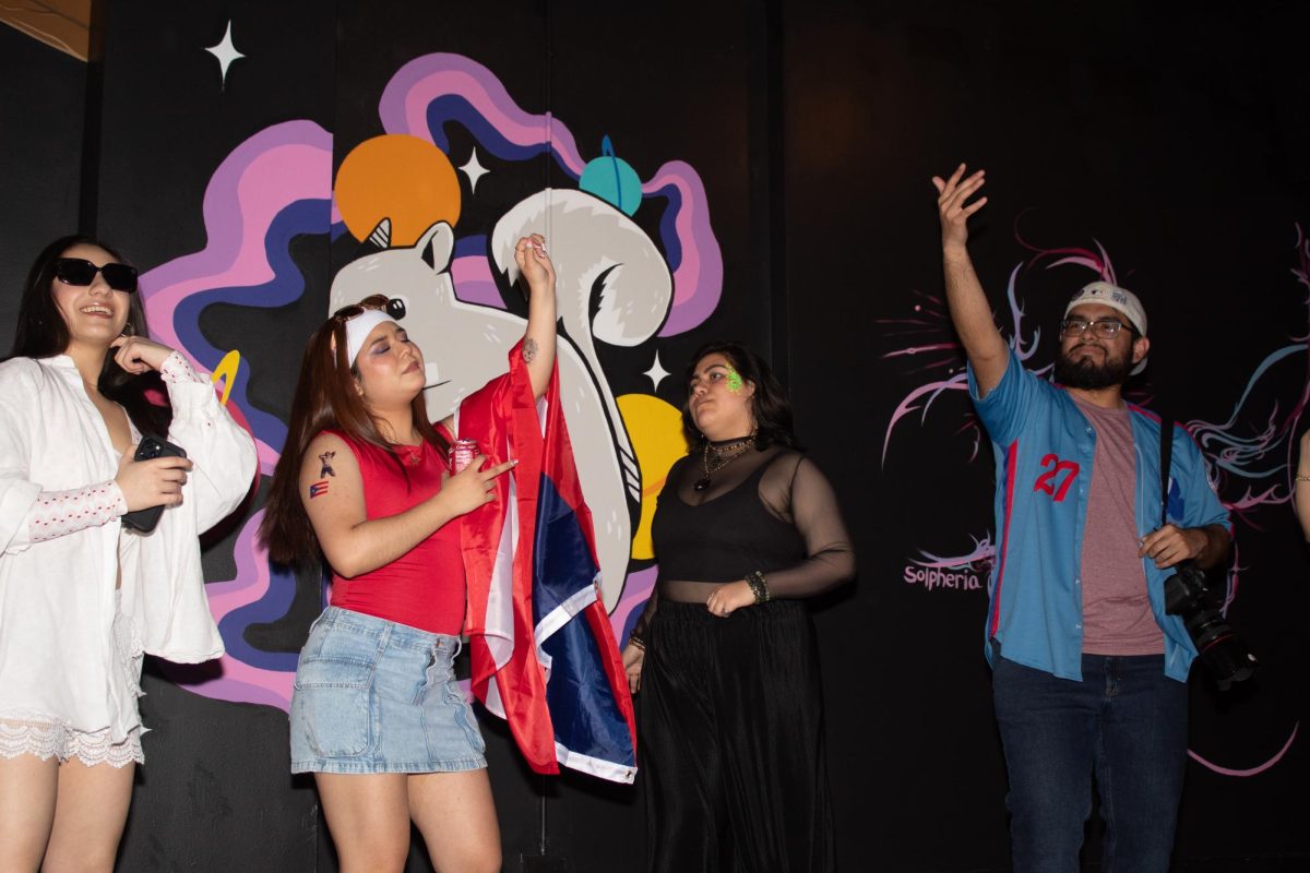 Fuego Fest attendees dance and call their friends onto the dance floor at HAUS on Friday, April 25, 2025.
