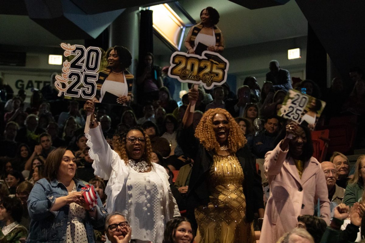 Families celebrate as their graduates cross the stage at commecement at Credit Union 1 Arena on Sunday, May 18, 2025.