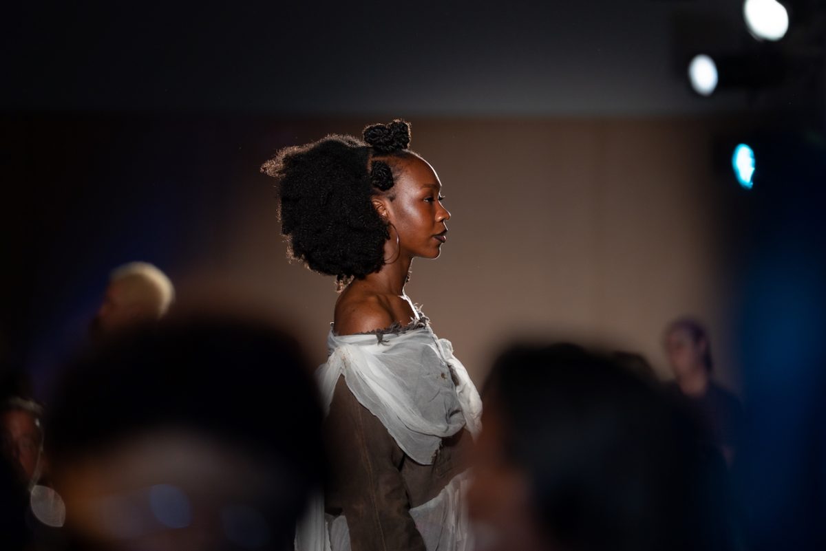 Tachinnah Tyler, a sophomore film and television major, wears a look by Yasmeen Wilson, a senior fashion design BFA major, in the collection “Interwoven Cultures” that was a part of the Made@Columbia Fashion Show at the Student Center on Friday, May 16, 2025.