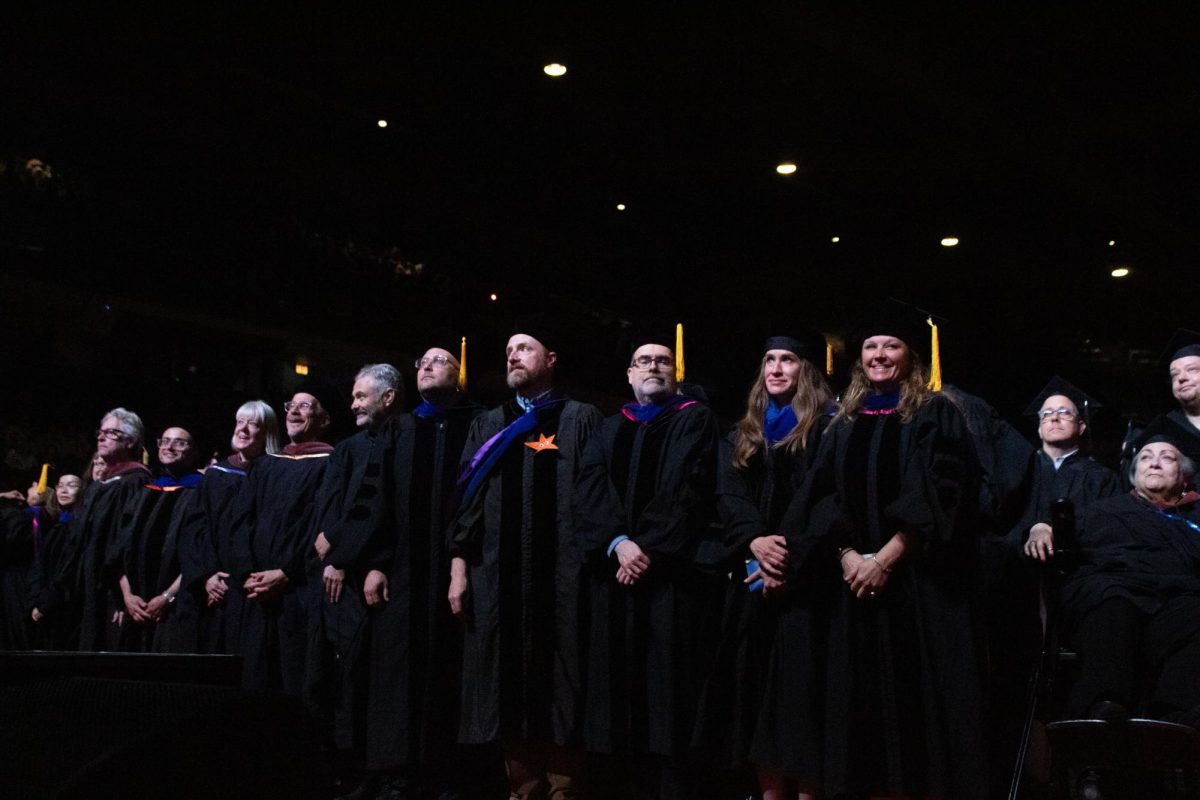 Faculty receive a standing ovation at the second ceremony on Sunday, May 18, 2025.