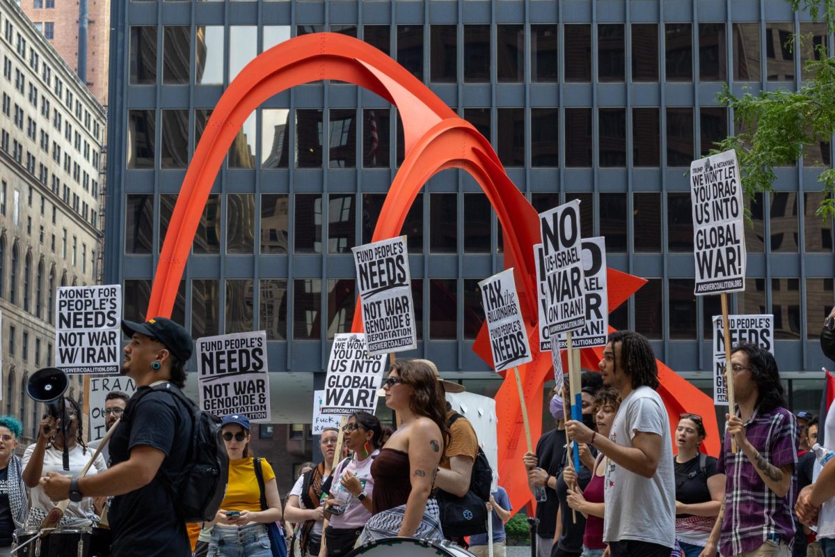 Protestors gather in Federal Plaza to protest against the war in Iran on Thursday, June 26, 2025.