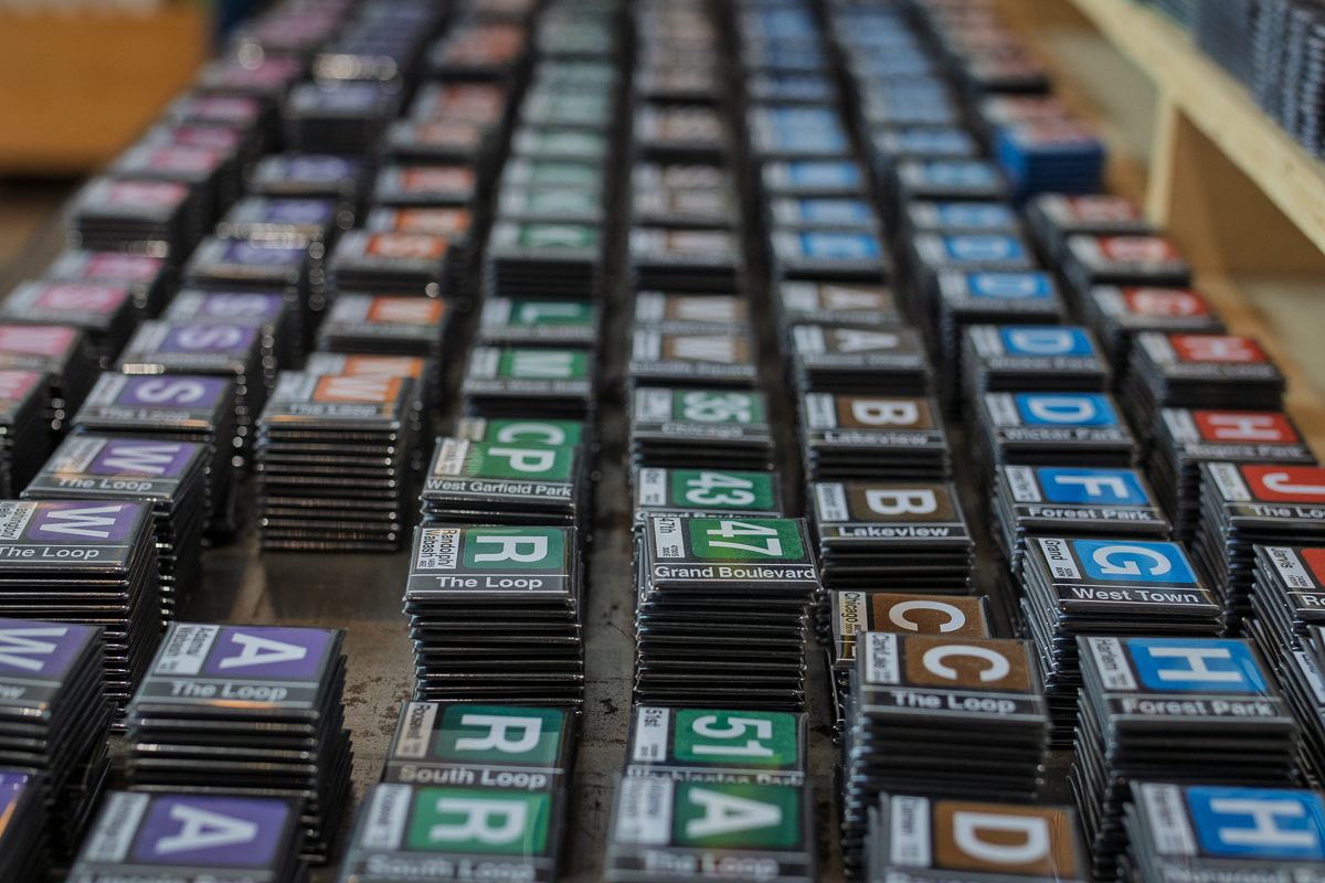 Magnets featuring CTA train and bus stops are displayed at Transit Tees, a Chicago-inspired shop located at 1371 N. Milwaukee Ave., on Thursday, June 26, 2025.