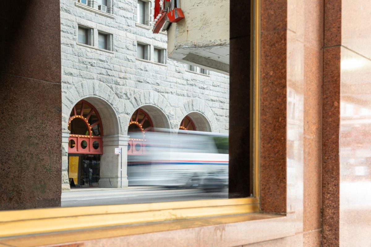 A window reflection of the Auditorium Theatre on East Ida B. Wells Drive on Tuesday, June 3, 2025.