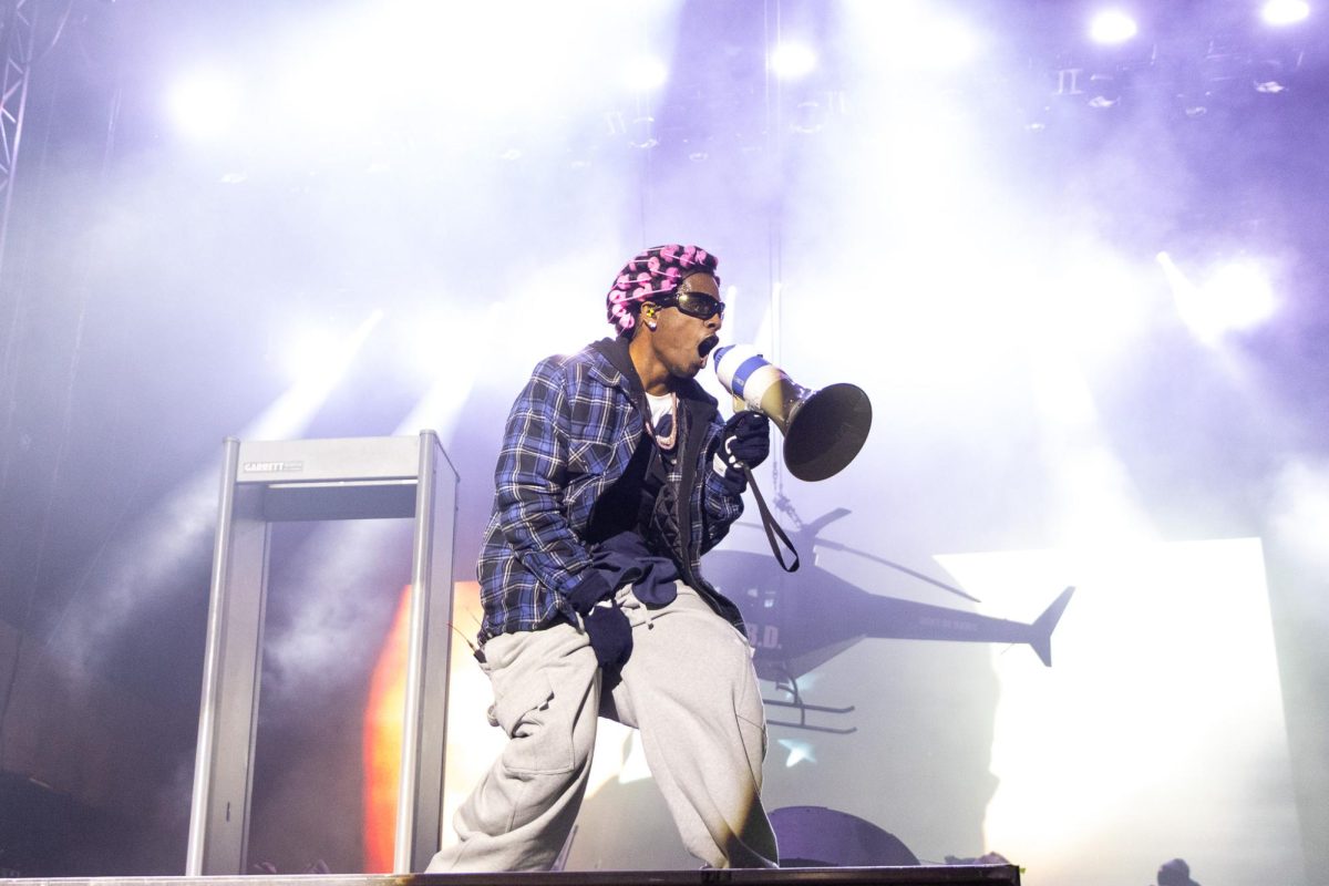 A$AP Rocky yells at the crowd through the megaphone during his Lollapalooza set on Sunday, Aug. 3, 2025.