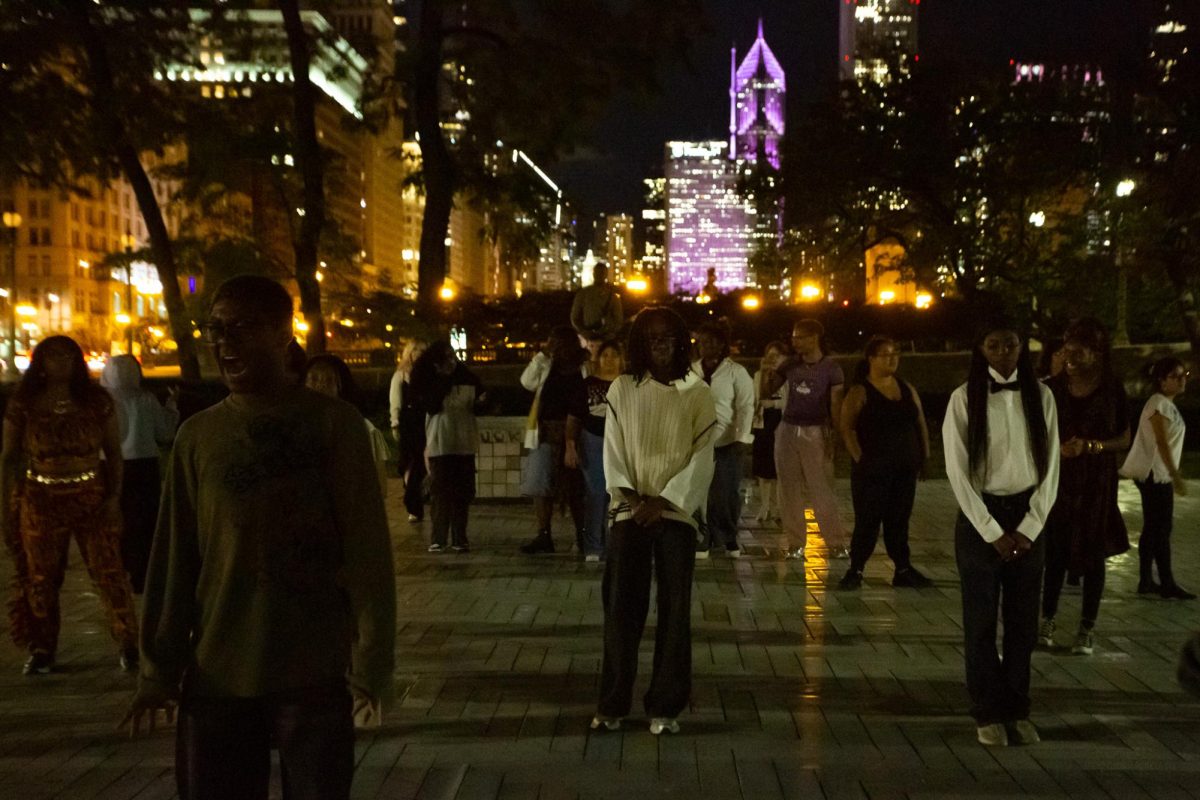 Columbia students practice in Grant Park on Tuesday, Oct. 14, 2025, for Chicago's annual Arts in the Dark Parade that takes place on Saturday, Oct. 18, 2025