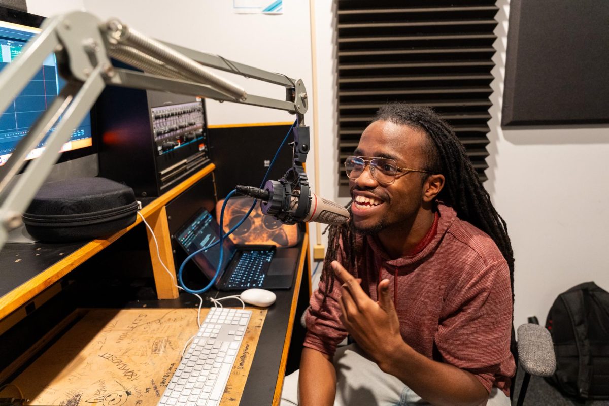 Kelvin Davis, a sophomore radio major, records audio for his podcasting class at 33 E. Ida B. Wells Dr. on Monday, Nov. 24, 2025.