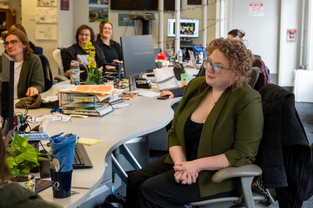 Sydney Richardson, a senior journalism major and current deputy editor, listens to the announcement of her new position as editor-in-chief, starting in the spring semester of 2026, on Friday, Dec. 5, 2025.