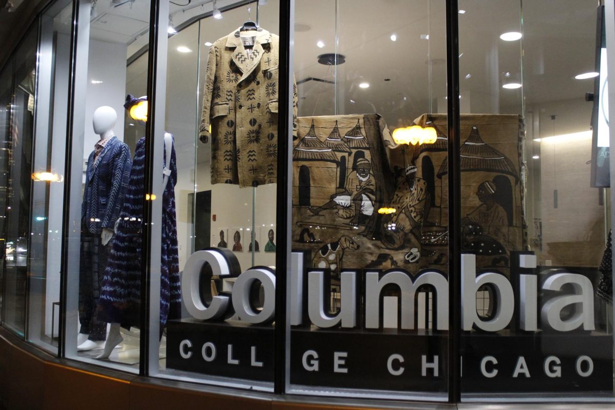 The exhibit presented by "Black Artistry and the Archiv" class is displayed in the front windows of the 618 S. Michigan Ave. building on Tuesday, Dec. 9, 2025.