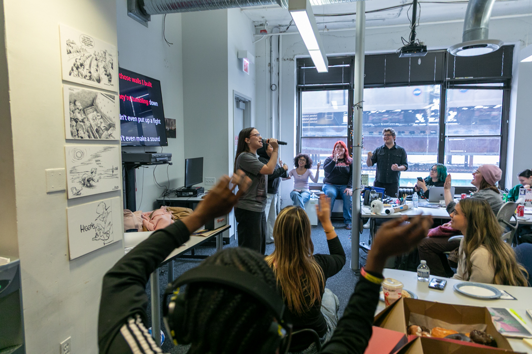 The Chronicle celebrates its end-of-semester party with karaoke in the Chronicle Newsroom on the second floor of 33 E. Ida B. Wells Drive on Friday, Dec. 12, 2025.