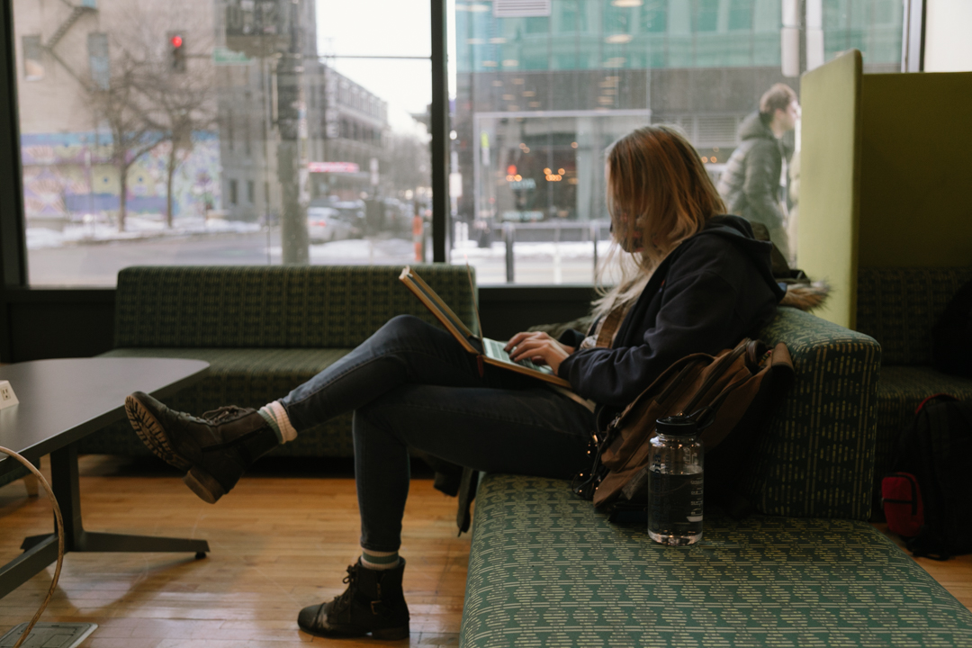 Emily Kirby, a first-year film and television student, takes the time to get school work done on her second day of classes in the Conway Center of the 1104 S. Wabash Ave. building, Tuesday, Jan. 27, 2026.
