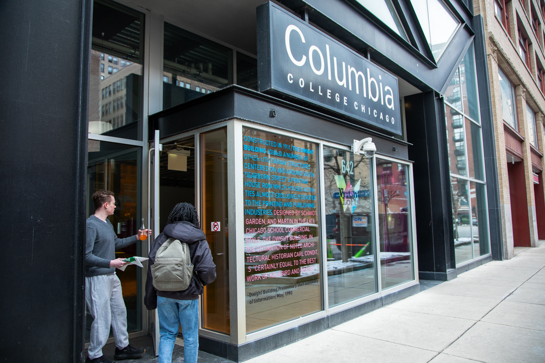 Two people enter the Dwight Lofts on 642 S. Clark St. on Sunday, Feb. 22, 2026.