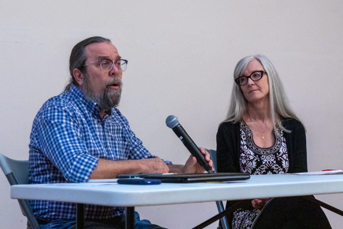 David Woolley, Professor of Instruction, and Suzanne McBride, Interim Senior Vice President and Provost, host the town hall meeting at Ferguson Hall, ground floor of the 600 S. Michigan Ave. building, on Wednesday, Feb. 18, 2026.