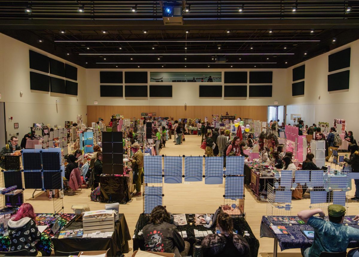 Students gather around vendor tables during Ink Fest on the fifth floor of Columbia College Chicago’s Student Center at 754 S. Wabash Ave., browsing custom prints, drawings, paintings and handmade merchandise on Friday, Feb. 13, 2026.