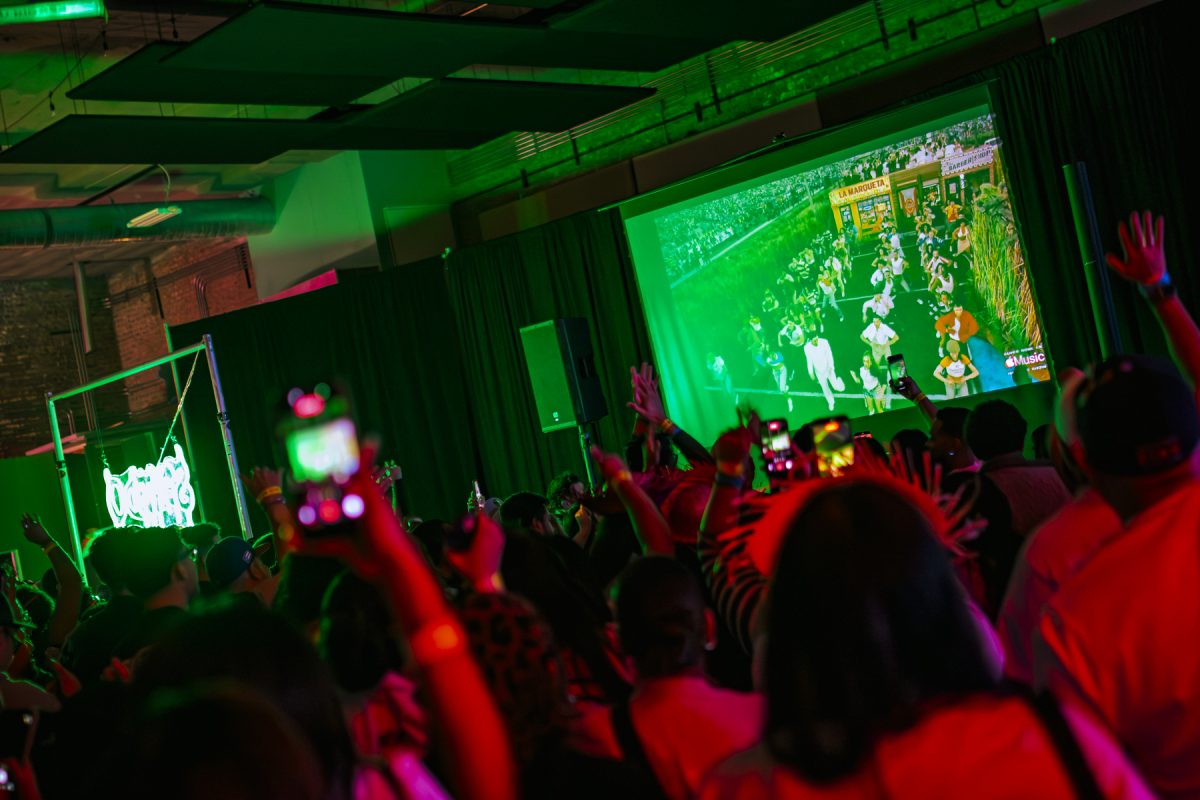 Attendees of Sentido's 18th event watch Bad Bunny's Super Bowl halftime show at SRBCC on Sunday, Feb. 8, 2026. 
