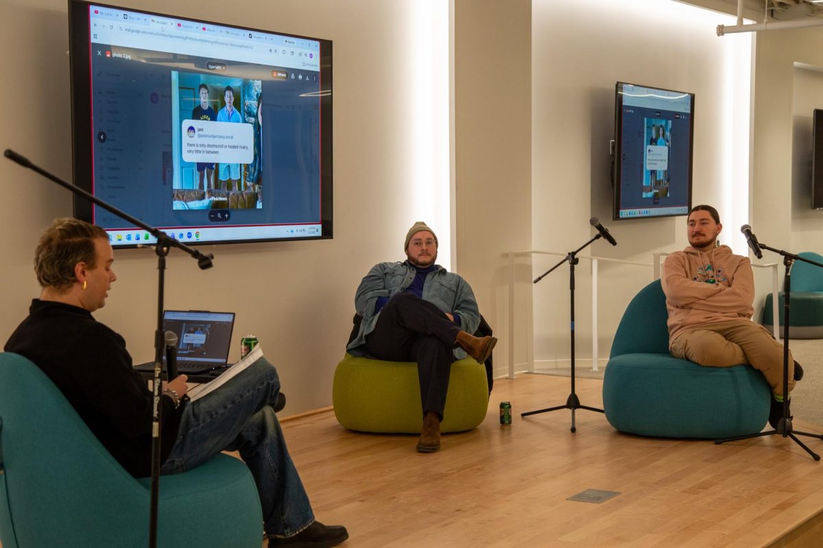 Panelists for the Heated Rivalry Discussion discuss the hit HBO Max series in The Hive at 618 S. Michigan Ave. on Thursday, Feb. 5, 2026. The panelists include Coordinator of Education and Community Development, Matthew RIllie (left), theatre director and film producer, Topher Williamson and senior ASL English-interpretation major, John Reyes.