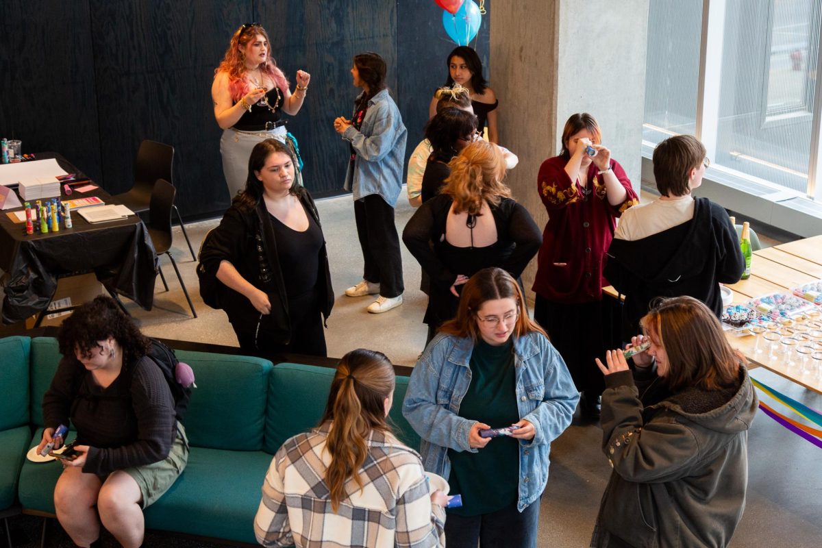 Students check out the kaleidoscopes provided at the Manifest Mixer in the Student Center on Thursday, Feb. 19, 2026.