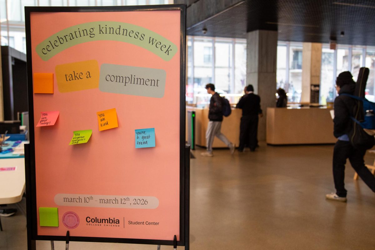 The Center for Student Wellbeing posts a "take a compliment" board in the lobby of the Student Center. Students and staff are encouraged to share kind messages on sticky-notes for others to celebrate Kindness Week on Tuesday, March 10, 2026.