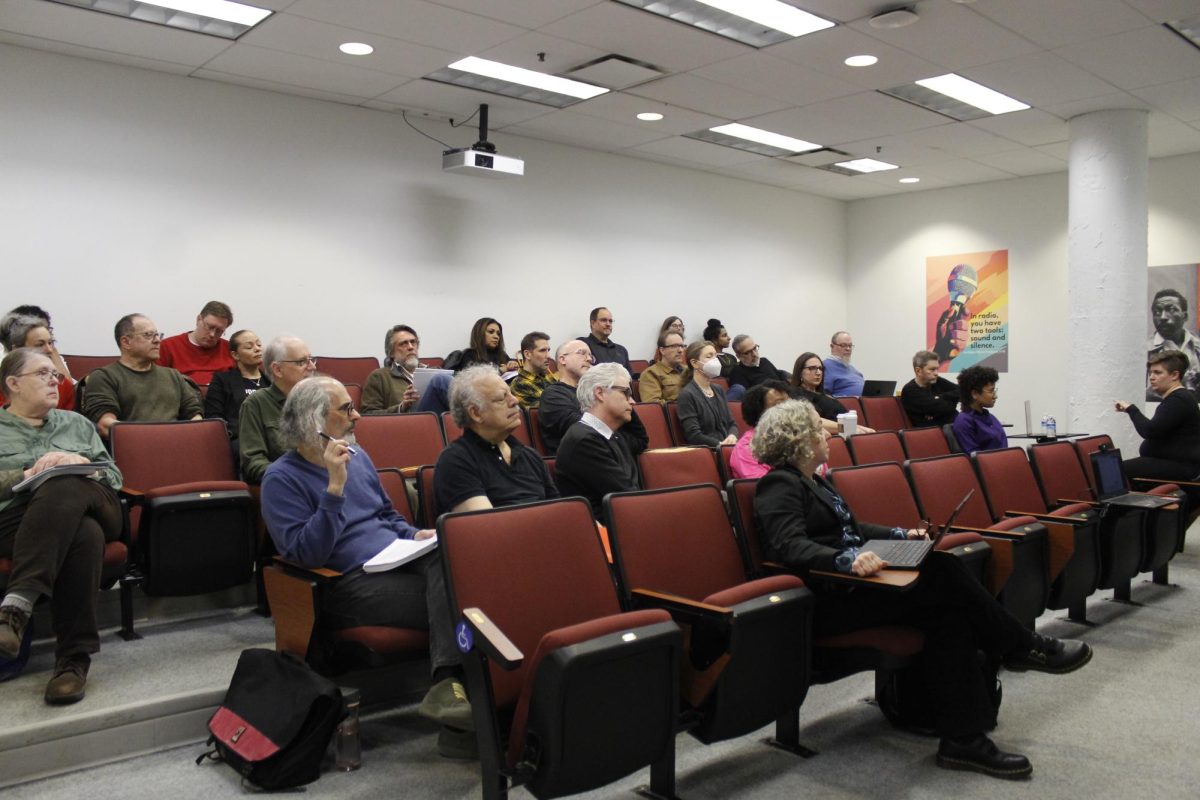Faculty attend the meeting for School of Communication and Culture faculty on April 3, 2026.