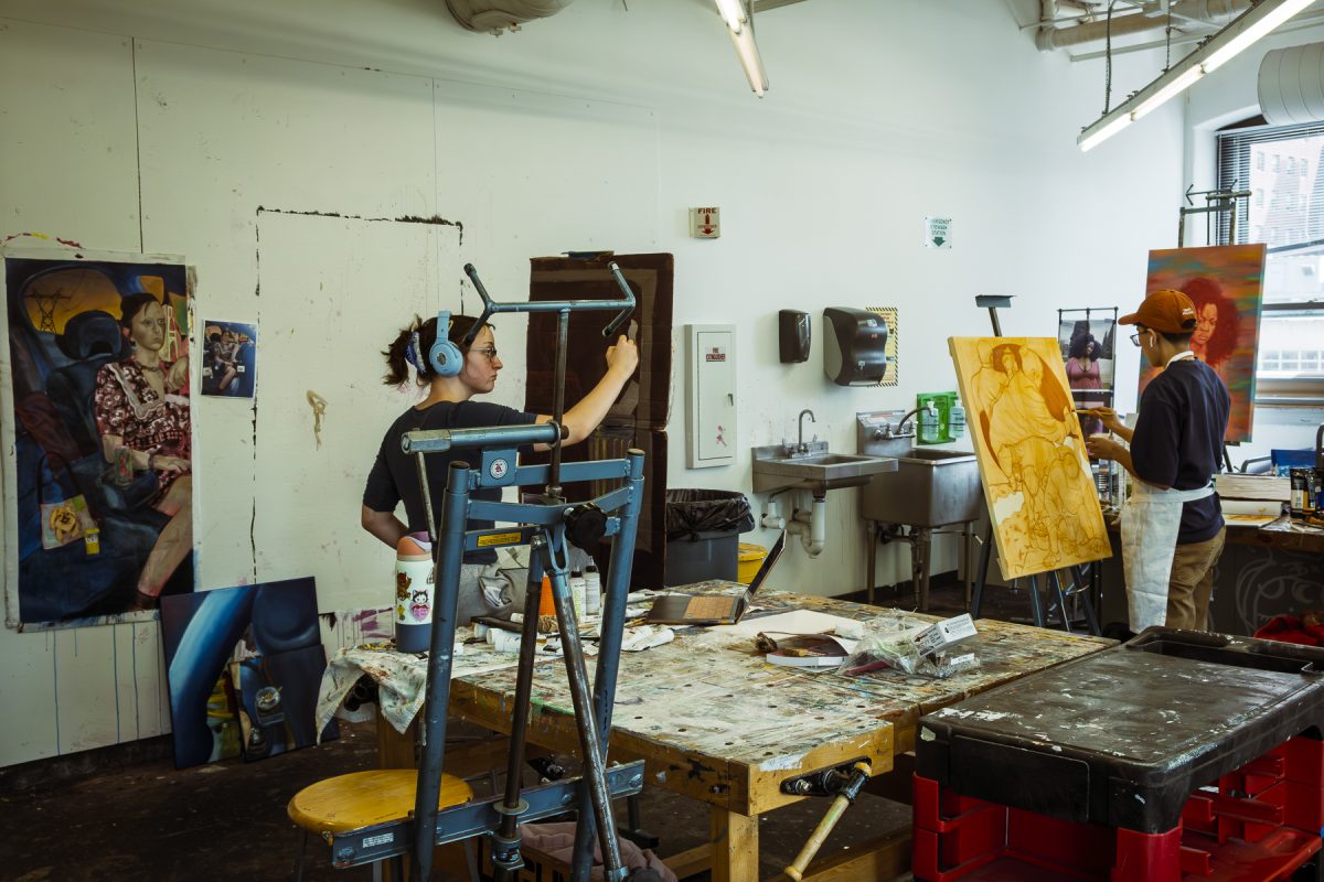 Daphne Carroll, a sophomore film and television major, and Felix Castro, a sophomore fine arts major, work on final projects at the open studio on the 8th floor of the 623 S. Wabash Ave. building, on Thursday, April 23, 2026. 