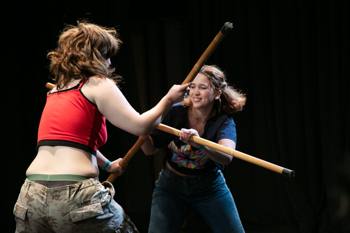 Roisin Darby and Clara Fasani reenact a fight scene between Ramona Flowers and Roxanne "Roxy" Richter from Scott Pilgrim vs. the Universe at the Manifest Combat Showcase at the Sheldon Patinkin Theatre of the 72 E. 11th St., Saturday, May 16, 2026.