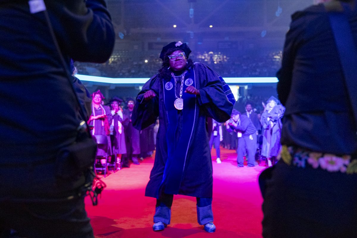 President and CEO Shantay Bolton dances to the stage during Columbia’s afternoon commencement at the Credit Union 1 Arena on May 17, 2026.