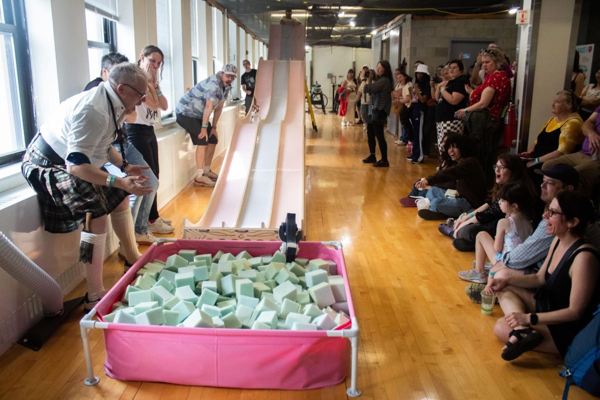 Attendees of the School of Visual Arts's annual Derby Race watch two student-made race cars go head to head at the 623 S. Wabash Ave. building on Saturday, May 16, 2026.