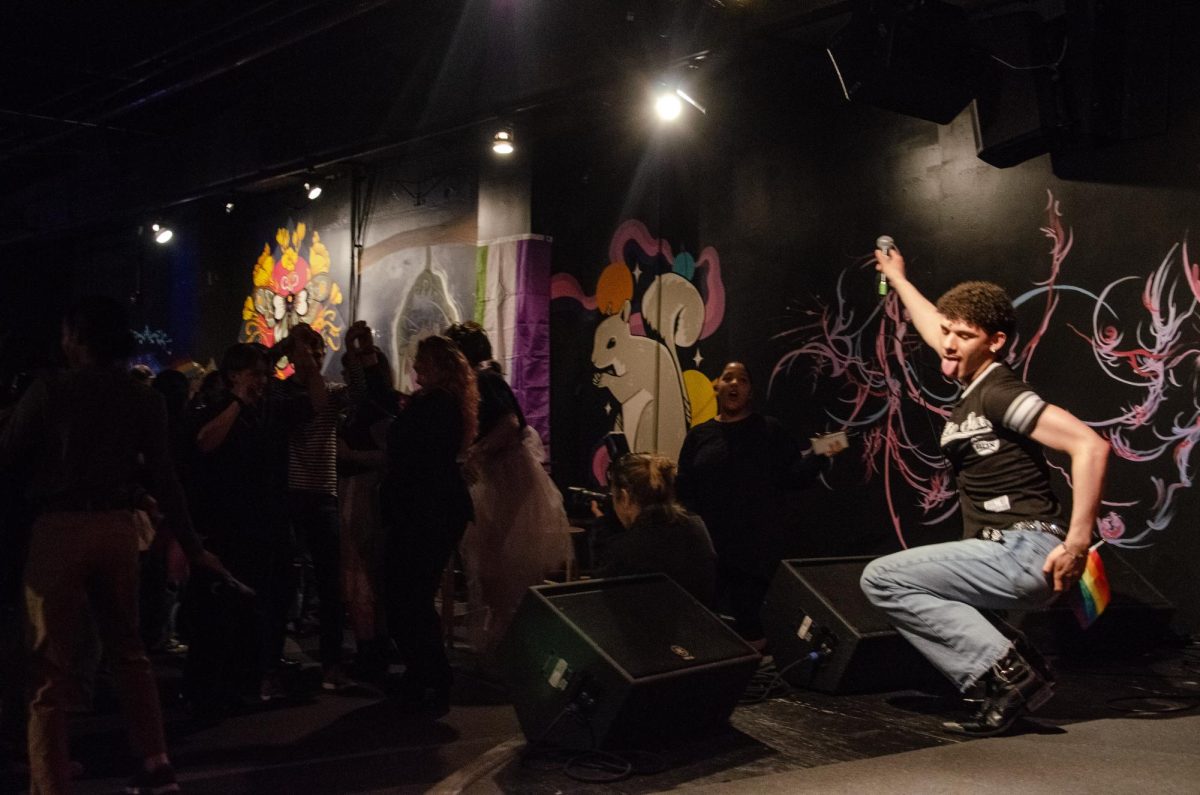 Senior music business major Ethan Alonzo performs for a crowd of students at the "Unity Ball" at the Haus at 623 S. Wabash Ave. on Friday, May 8, 2026.