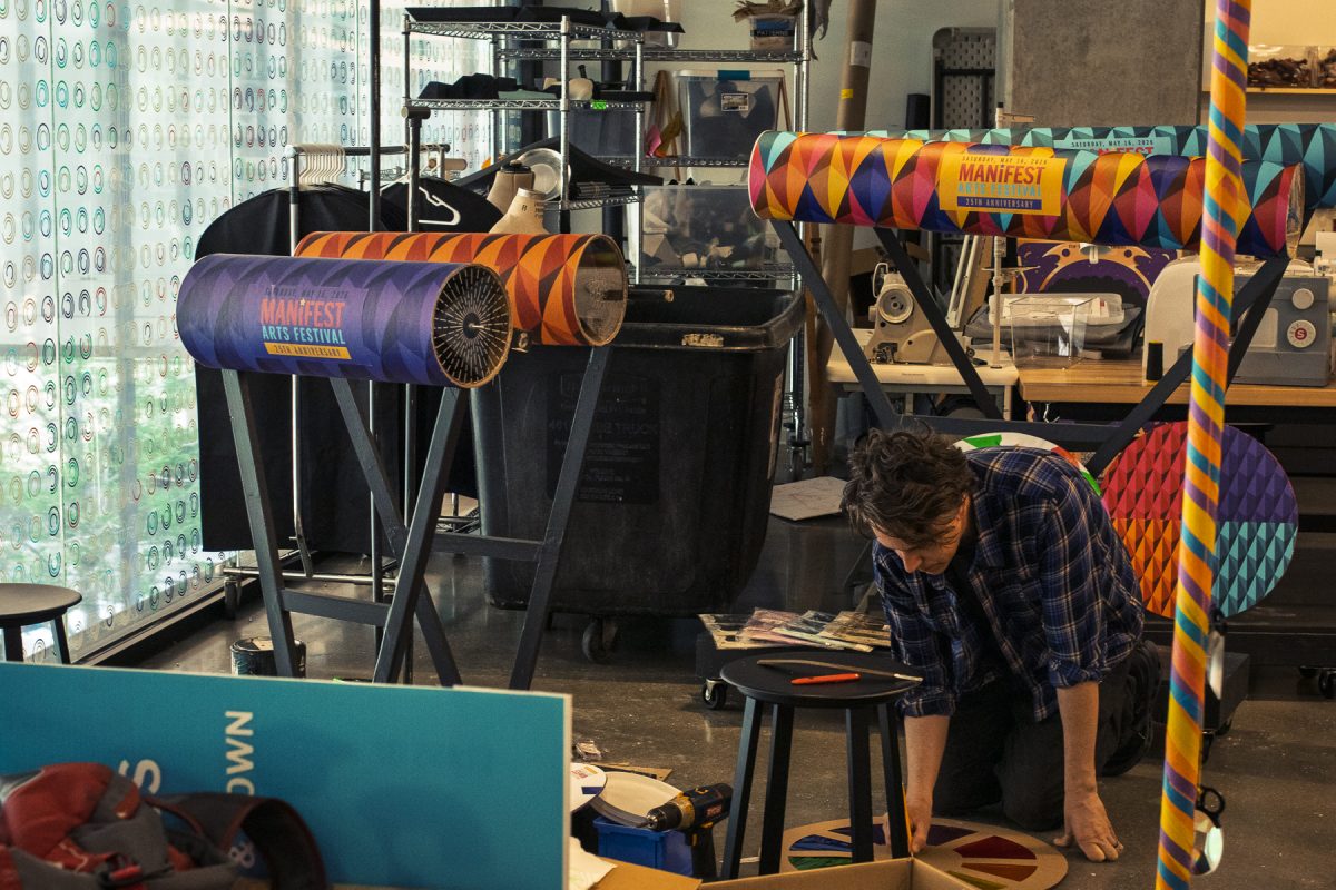 Mark Porter, a Columbia staff member and employee of the Makerspace, works on art for the Manifest Arts Festival in the Makerspace on the second floor of the Student Center on Wednesday, May 13, 2026.