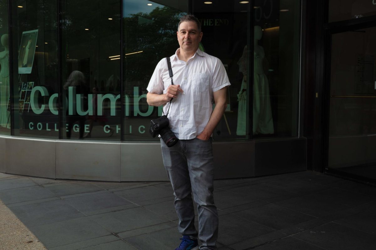Pulitzer Prize winning photojournalist and Columbia College alum Chris Sweda for his contribution in The Chicago Tribunes “64 days in Chicago: The story of Operation Midway Blitz” in front of the 618 S. Michigan Ave. building on Tuesday, May 26, 2026.