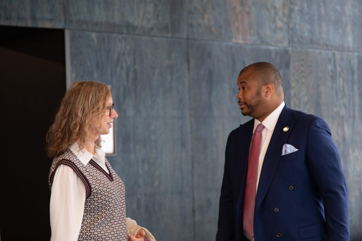 Beth Ryan, professor of Instruction in the School of Business and Entrepreneurship, and Adriel Hilton, the college’s vice president of institutional strategy and chief of staff, confer outside the boardroom at the Student Center on Wednesday, May 6, 2026. Ryan and Hilton were co-chairs of the Strategic Planning Task Force.