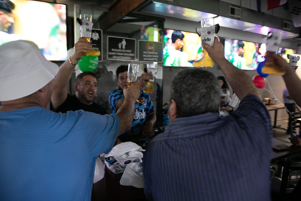 Fans of Mexico cheer with beers after Mexico's 2-0 win over South Africa during a FIFA World Cup watch party on Thursday, June 11, 2026, in Edgewater, Chicago.