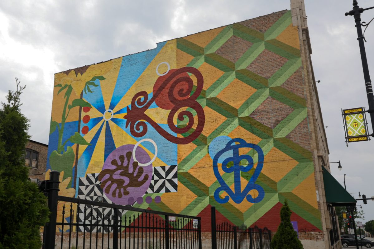 Colors of Community, a mural in the Auburn Gresham neighborhood of Chicago, on Monday, June 8, 2026. The mural features vibrant colors and patterns. This photo is part of the Columbia Chronicle’s “77 Community Areas” project, documenting Chicago ahead of America’s 250th birthday.