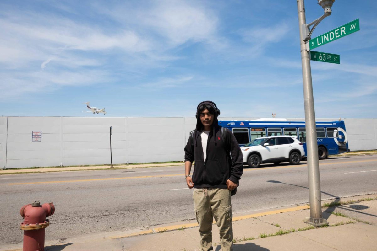 Anthony Gutierrez, a resident of the Clearing neighborhood, walks home from classes. Clearing is a neighborhood in the Southwest Side of Chicago. This photo is part of the Columbia Chronicle’s "77 Community Areas" project, documenting Chicago ahead of America’s 250th birthday.