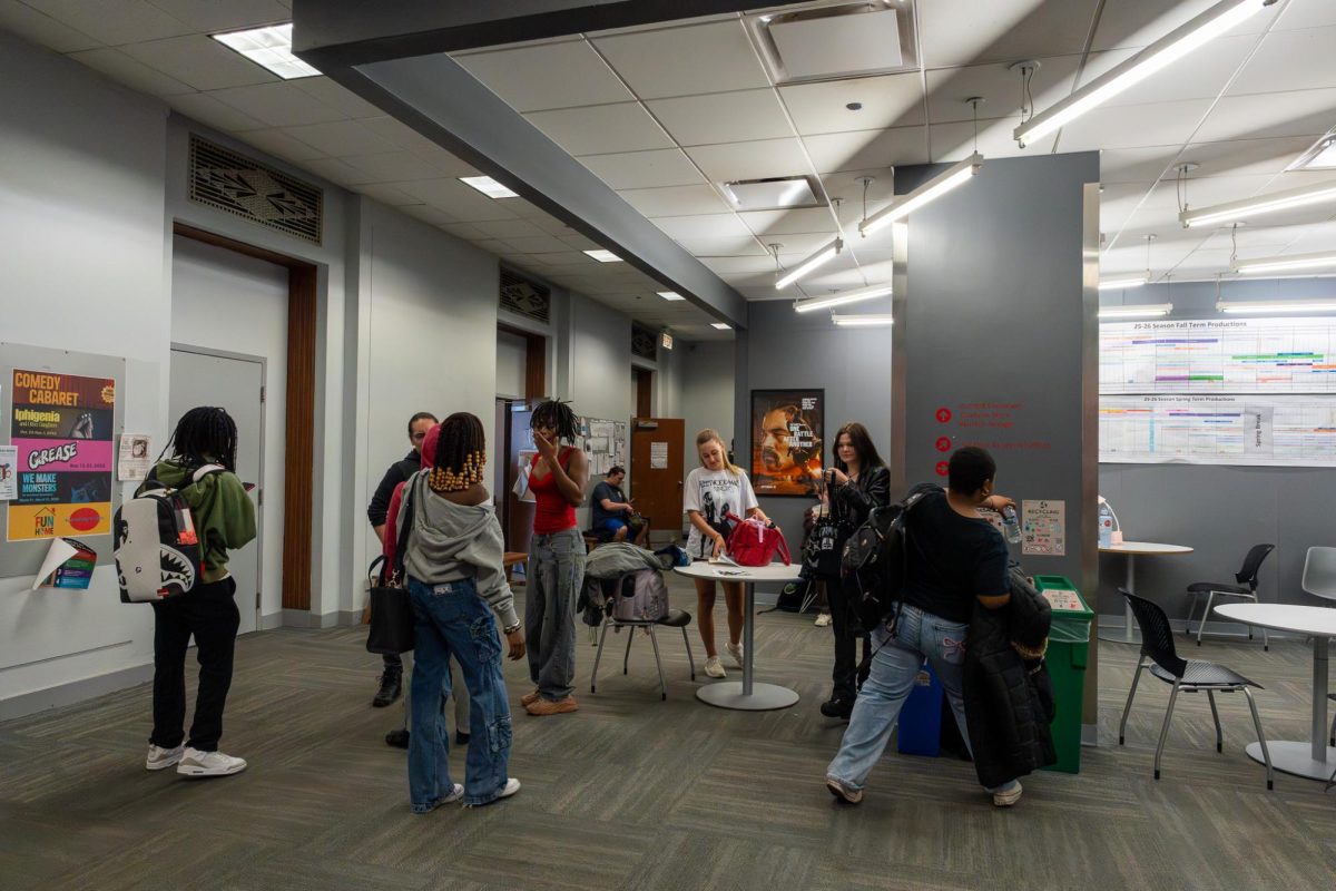 Students hang out in the common area of 72 E. 11th St. on April 16, 2026.