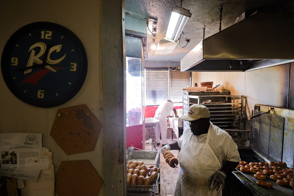 Vincent Gray makes doughnuts the old-fashioned way in the Roseland neighborhood, Thursday, July 23, 2026. Opening in 1972, owner Buritt Bulloch, known by his customers as Mr. B, has proudly served the Roseland neighborhood in his storefront, Old Fashioned Donuts, for over 50 years. This photo is part of the Columbia Chronicle’s “77 Community Areas” project, documenting Chicago in celebration of America’s 250th birthday.
