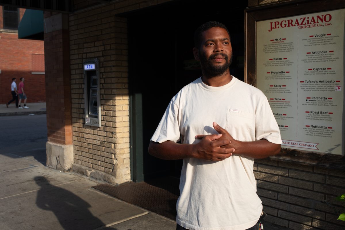 Rob Bates, photographer and longtime Chicago resident, takes an afternoon walk at Fulton Market District in the Near West Side community area on Wednesday, July 15, 2026. This photo is part of the Columbia Chronicle’s “77 Community Areas” project, documenting Chicago in celebration of America’s 250th birthday.