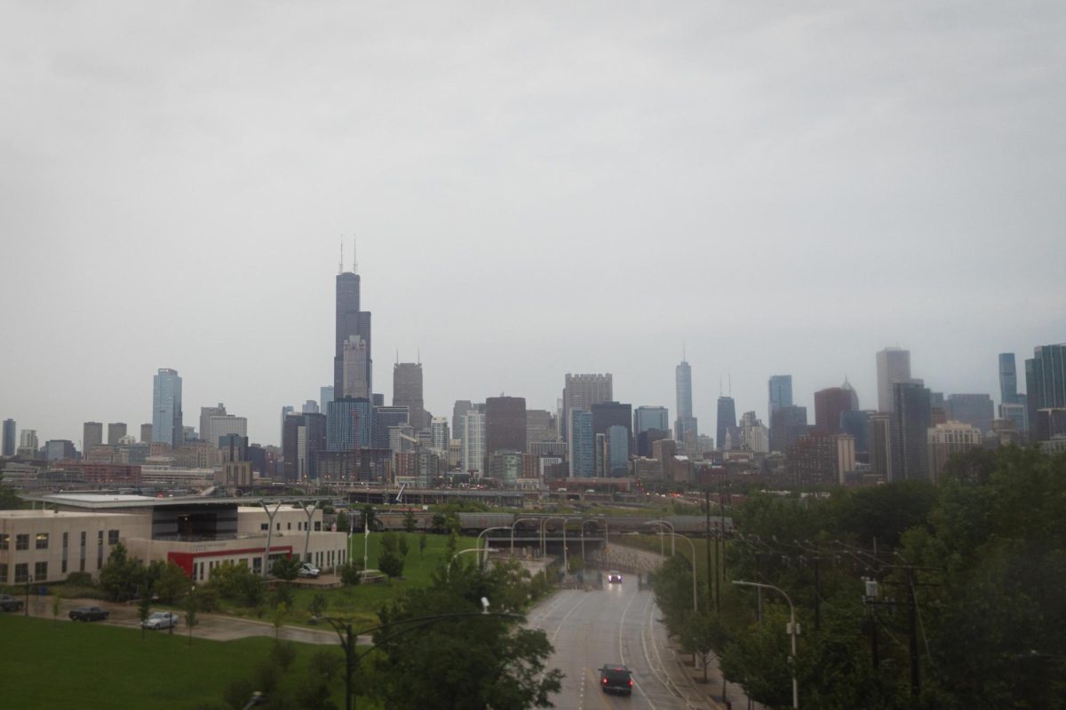 Low clouds and overcast skies hang over the Willis Tower and the Chicago skyline following a summer storm system in Chicago on Tuesday, Aug. 11, 2026.