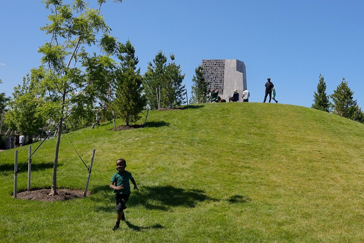 Kids play on the Obama Center's Great Lawn in Jackson Park on Chicago's South Side on June 19, 2026. This photo is part of the Columbia Chronicle’s “77 Community Areas” project, documenting Chicago in celebration of America’s 250th birthday.