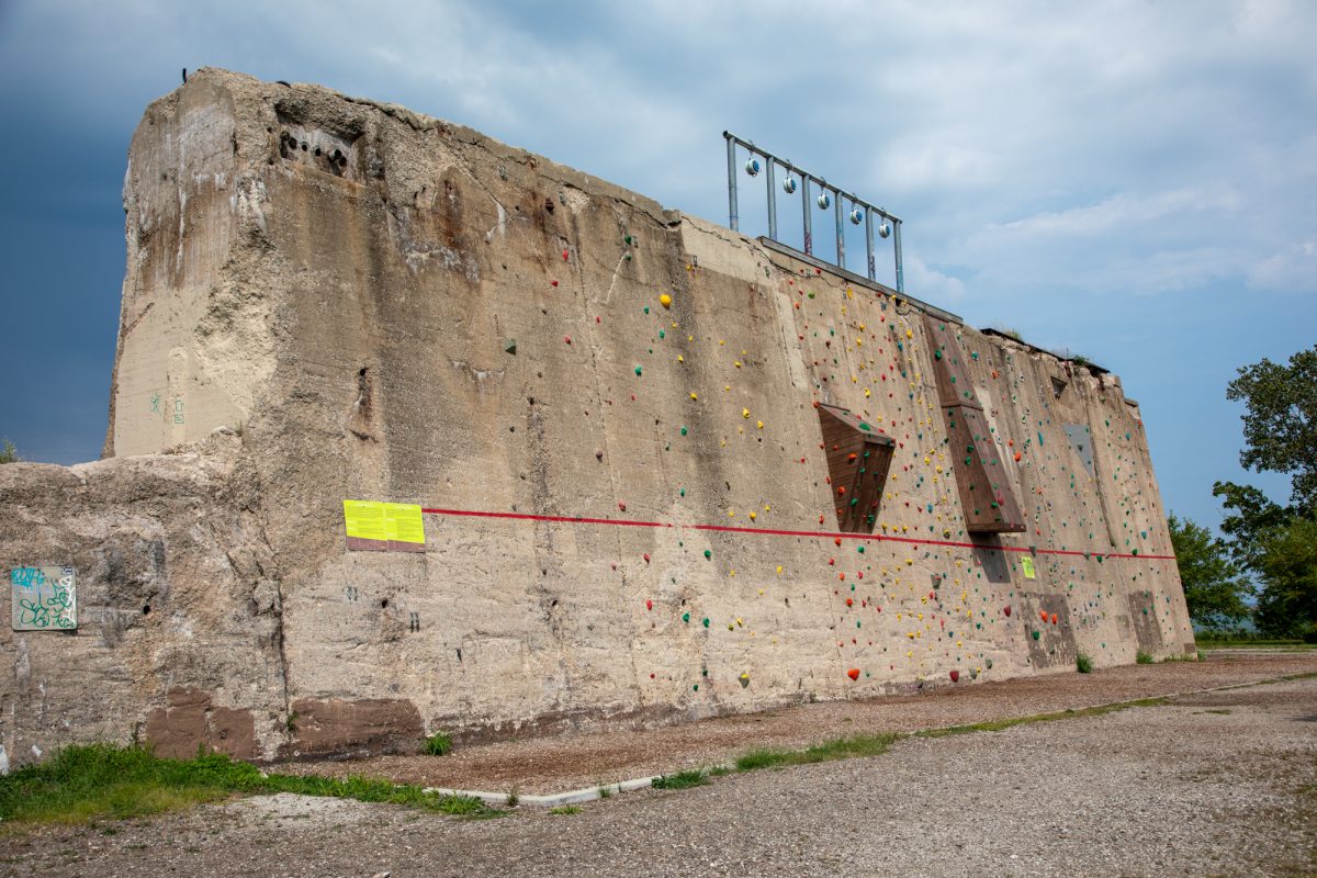 A storm cloud peeks over a climbing wall repurposed from an old steel factory at Steelworkers Park in Chicago’s South Shore neighborhood on Monday, Aug. 31, 2026. This photo is part of the Columbia Chronicle’s “77 Community Areas” project, documenting Chicago in celebration of America’s 250th birthday.