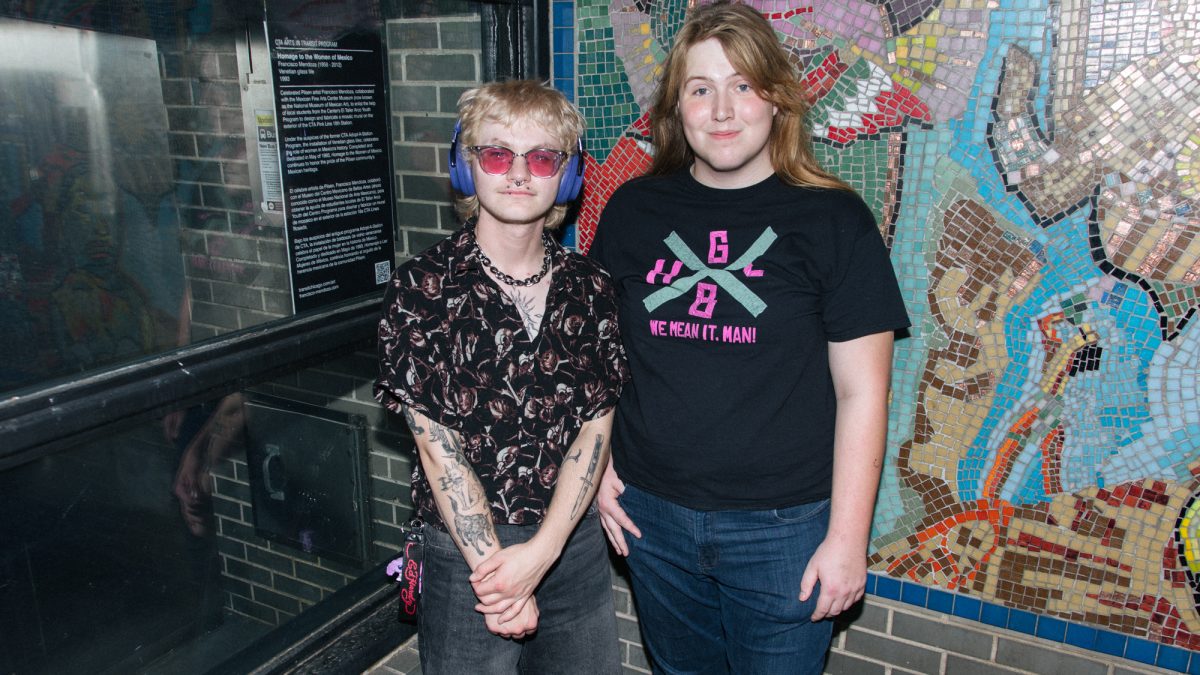 Aiden Fijal and Melpomene Ray Alexander, co-founders of Fruitbatz, A Queer Literary Magazine, talk about the beginning of their zine at the 18th Pink Line stop on Monday, Aug. 10, 2026.